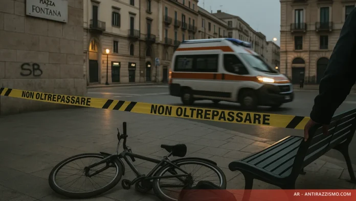 Alba nel centro storico di Taranto con bicicletta appoggiata a un muro, omaggio visivo al bracciante Bakari Sako